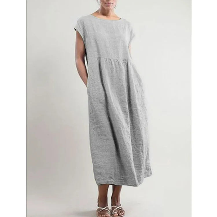 2024 Summer New Short Sleeved Women's Dress With Loose Casual Pockets Solid Color Round Neck Pullover Long And Elegant Dress