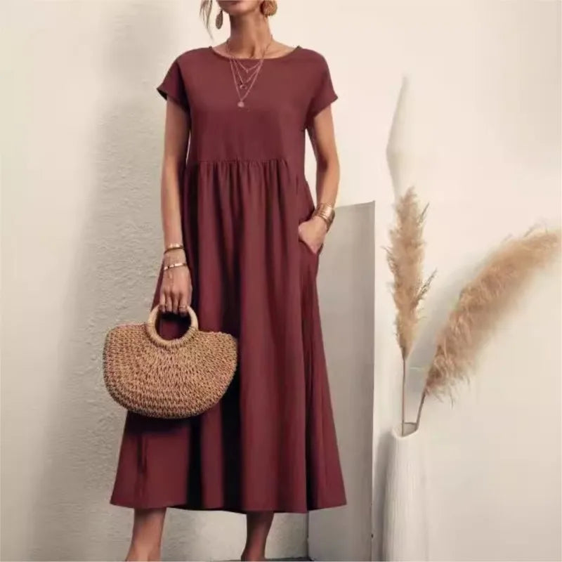 2024 Summer New Short Sleeved Women's Dress With Loose Casual Pockets Solid Color Round Neck Pullover Long And Elegant Dress