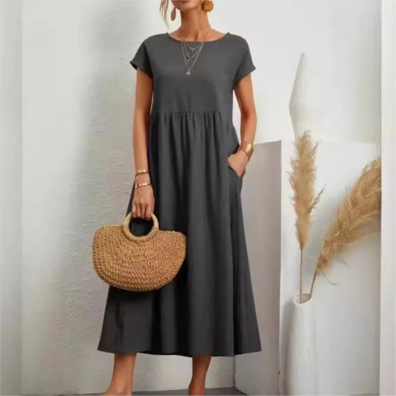 2024 Summer New Short Sleeved Women's Dress With Loose Casual Pockets Solid Color Round Neck Pullover Long And Elegant Dress