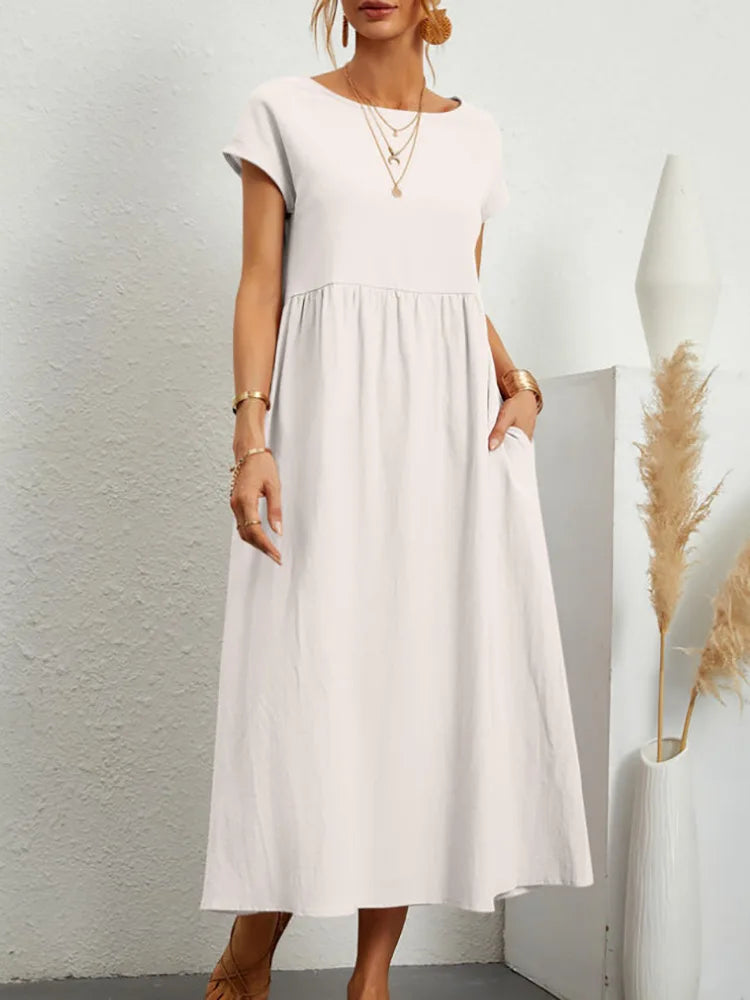 2024 Summer New Short Sleeved Women's Dress With Loose Casual Pockets Solid Color Round Neck Pullover Long And Elegant Dress