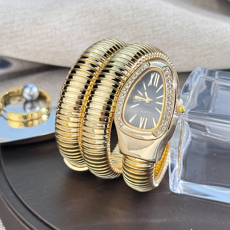 Women's fashion high quality Serpentine alloy watch with diamond case Celebrity style high-grade quartz bracelet watch