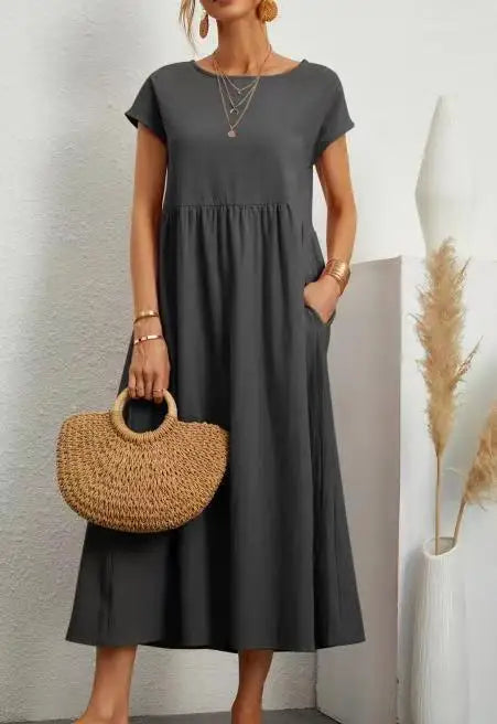 2024 Summer New Short Sleeved Women's Dress With Loose Casual Pockets Solid Color Round Neck Pullover Long And Elegant Dress