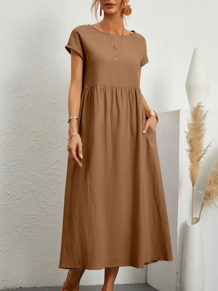 2024 Summer New Short Sleeved Women's Dress With Loose Casual Pockets Solid Color Round Neck Pullover Long And Elegant Dress