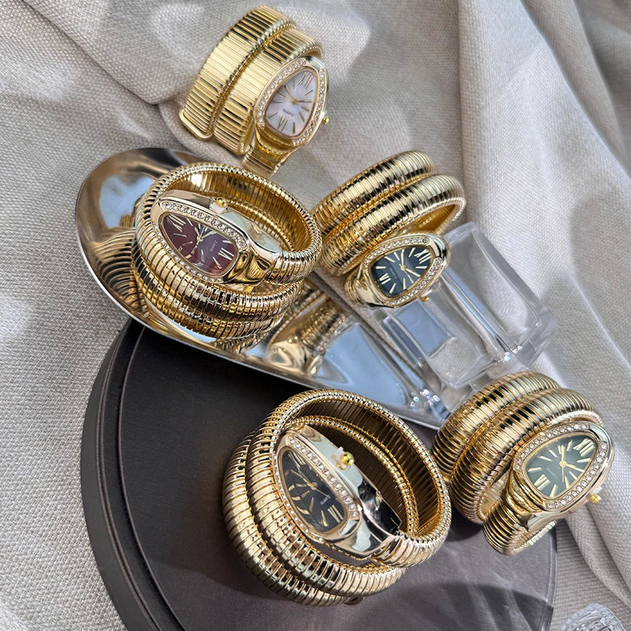 Women's fashion high quality Serpentine alloy watch with diamond case Celebrity style high-grade quartz bracelet watch