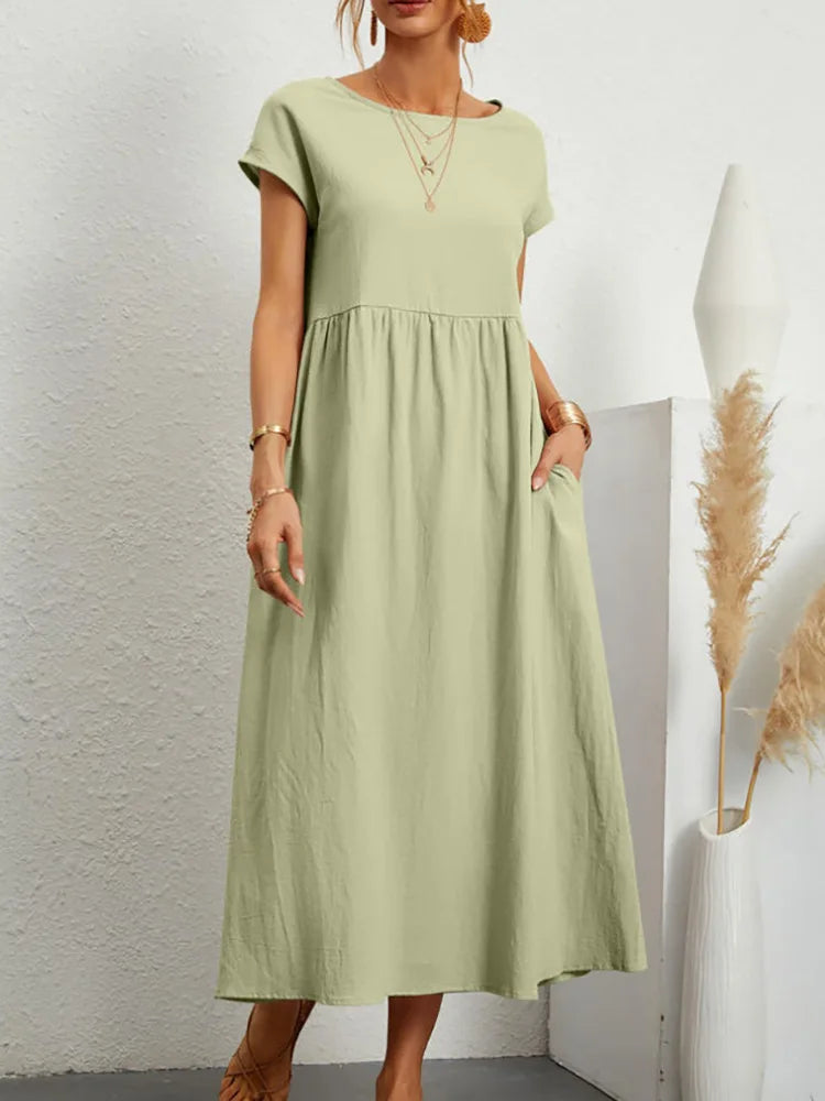 2024 Summer New Short Sleeved Women's Dress With Loose Casual Pockets Solid Color Round Neck Pullover Long And Elegant Dress